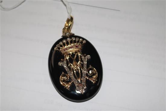 A Victorian gold, rose cut diamond and ruby set black enamel oval pendant locket, 49mm.